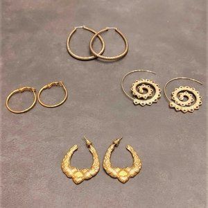 A Collection of Gold Costume Jewelry
